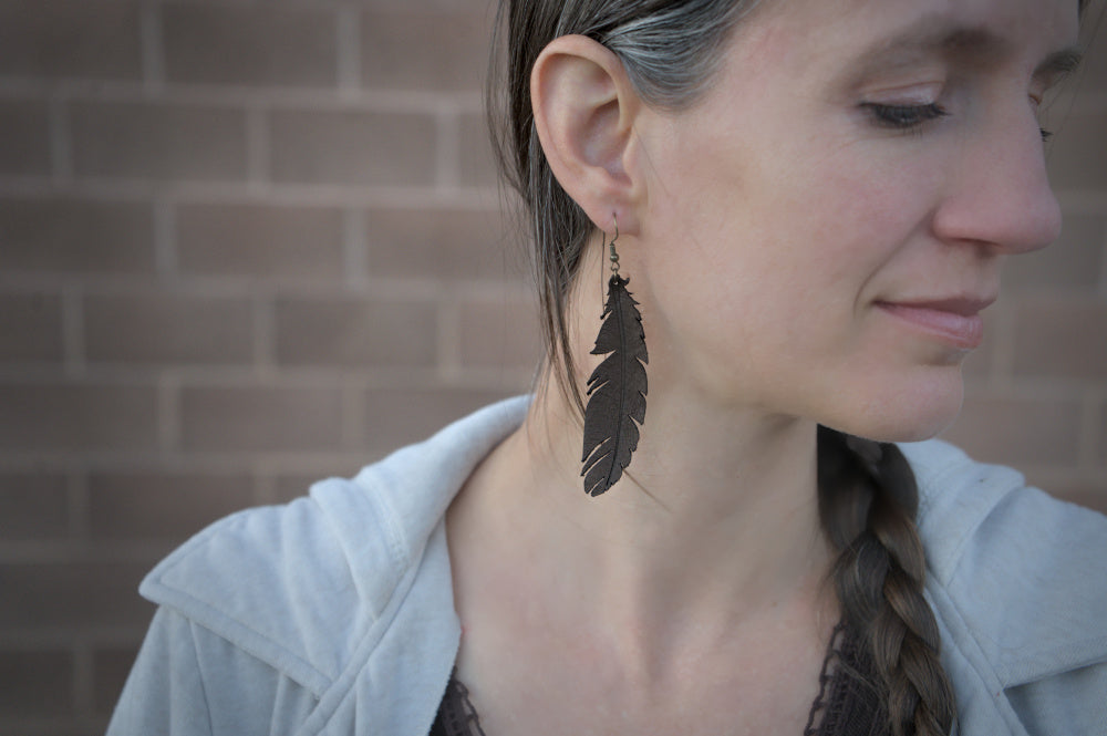 Feather piercing on sale